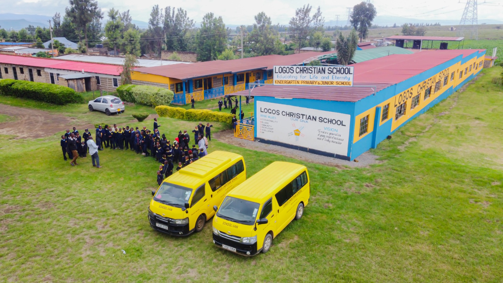 Morning assembly with the school vans