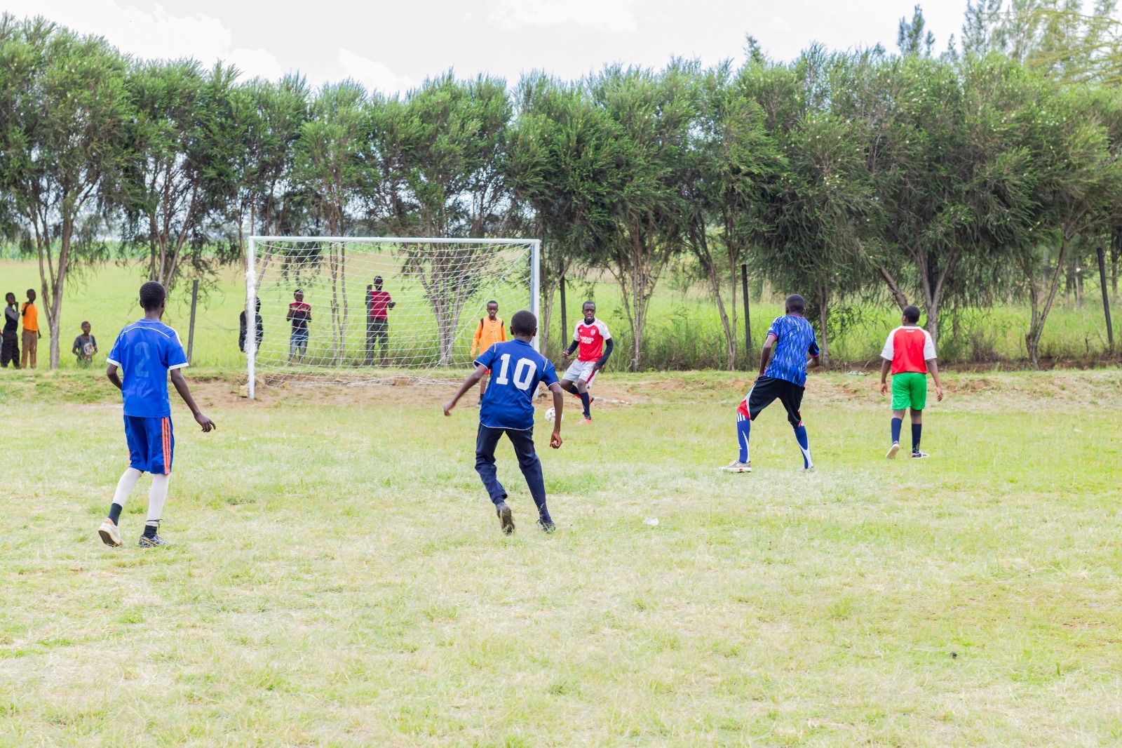Boys' team defending the goal